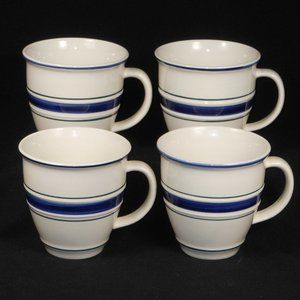 4 beautiful coffee mugs. Joshua Maxwell Blue Madison